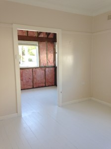 Front sunroom stripped and floor painted.